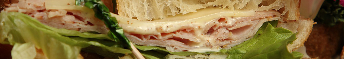 Eating Deli Sandwich at Vitelli's Deli restaurant in Victorville, CA.
